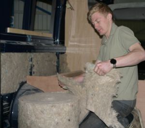 Jake insulating a Fiat Ducato Long Wheel Base van conversion with Thermafleece Cosywool.
