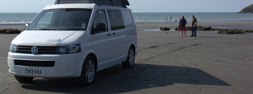 VW Motorhome on Poppit Sands beach copyright Poppit Campers Ltd